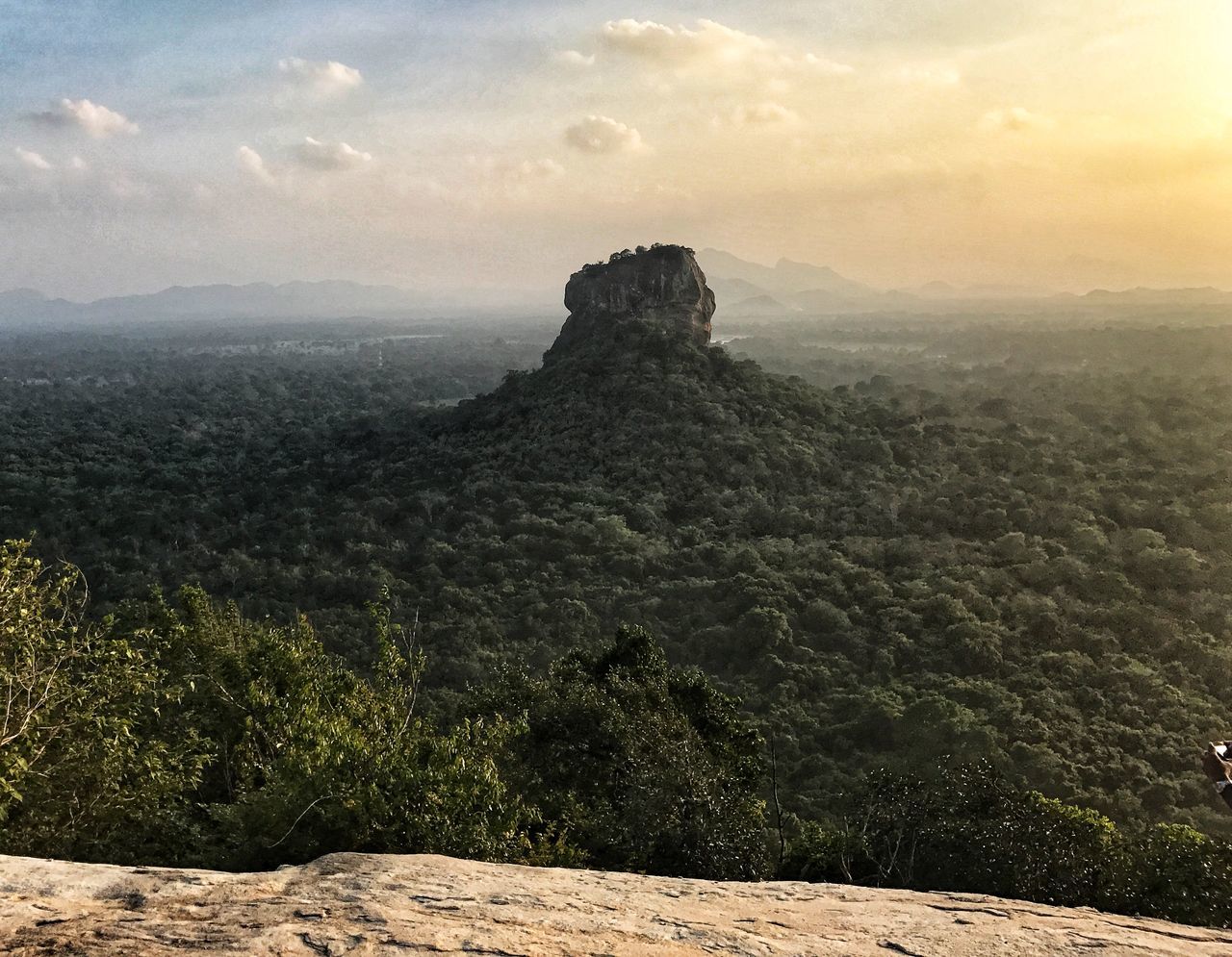 sky, scenics - nature, beauty in nature, tranquil scene, mountain, tranquility, cloud - sky, landscape, environment, non-urban scene, nature, no people, plant, rock, day, idyllic, land, tree, rock - object, rock formation, outdoors, mountain peak, arid climate