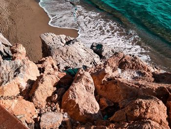 High angle view of rocks on beach