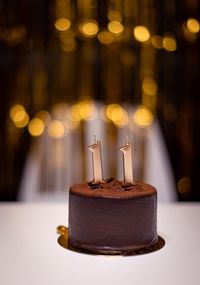 Close-up of birthday cake on table