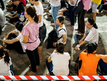 High angle view of people on street in city