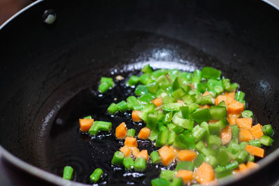 High angle view of chopped vegetables in pan