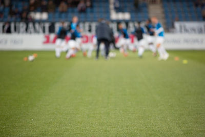 Group of people on soccer field