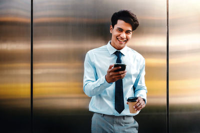 Young man using mobile phone