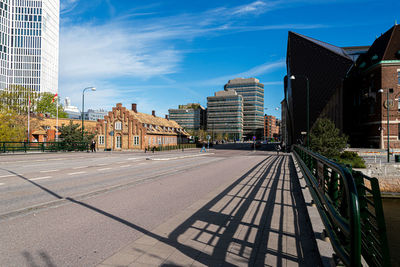 Buildings in city against sky