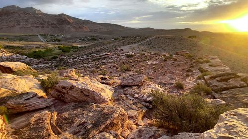 Scenic view of landscape against sky during sunset