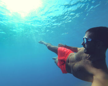 Full length of man swimming in sea