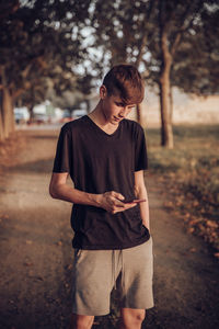 Full length of young man looking at camera