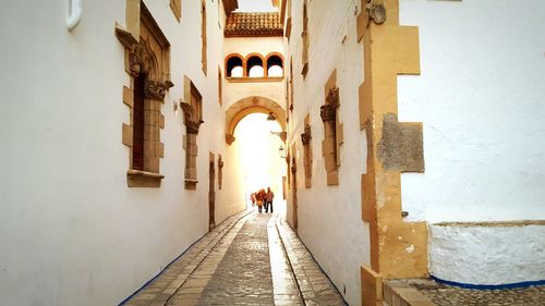 People walking in corridor