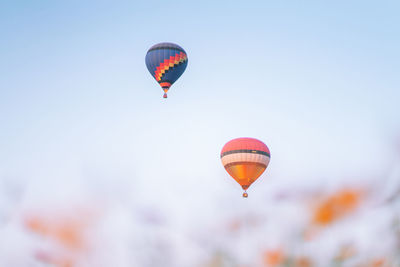 Low angle view of hot air balloon against clear sky