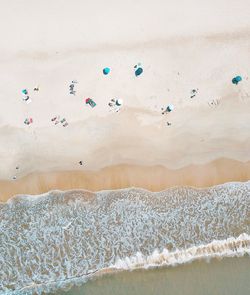 High angle view of people on sea shore