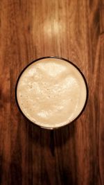 High angle view of beer in glass on table