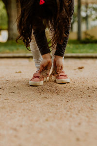 Child playing with sand