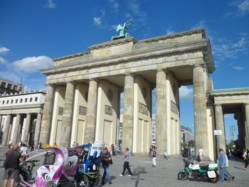 Tourists in front of historic building