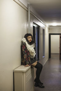 Portrait of a beautiful young woman wearing a leather jacket