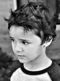 Close-up of boy looking away