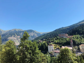 Scenic view of mountains against clear blue sky