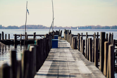 Scenic view of wooden pier in rippled water