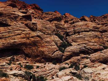 Low angle view of rocky mountain