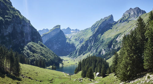 Panoramic view of landscape and mountains against clear sky