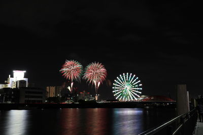 Firework display at night