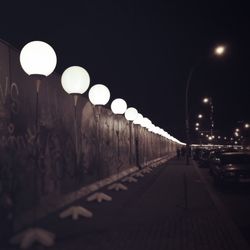 Illuminated street light at night