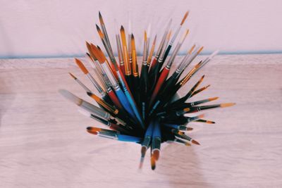 Close-up of colored pencils on table