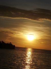 Scenic view of sea at sunset