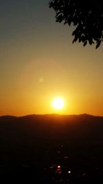 Scenic view of silhouette landscape against clear sky during sunset