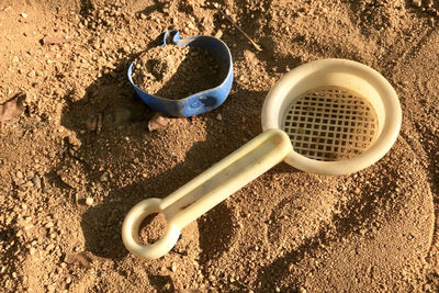 High angle view of children sand toys in the sand. 