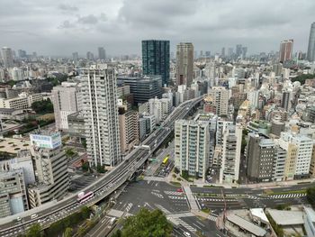High angle view of street amidst buildings in city