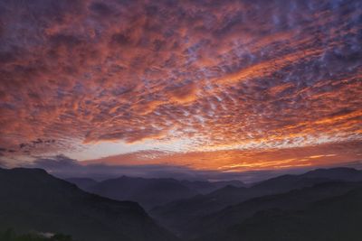 Scenic view of dramatic sky during sunset