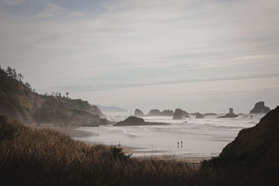 Scenic view of beach against sky