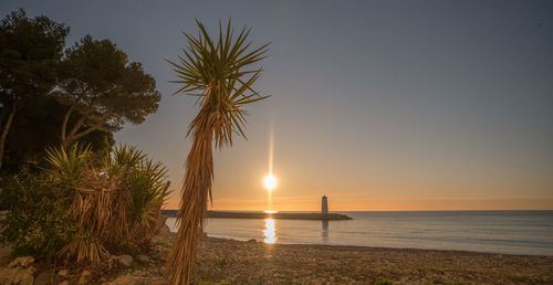 Scenic view of sea against sky during sunset