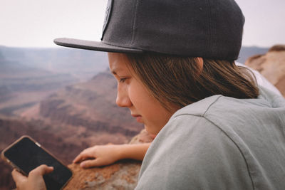 Portrait of senior woman using mobile phone