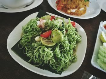 High angle view of salad served on table