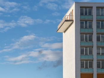 Low angle view of skyscraper against sky