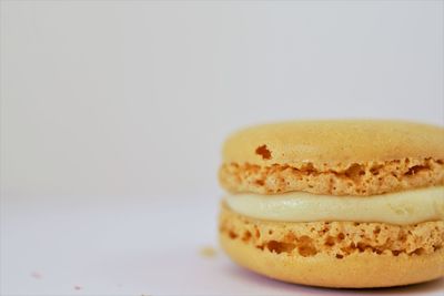 Close-up of cake against white background