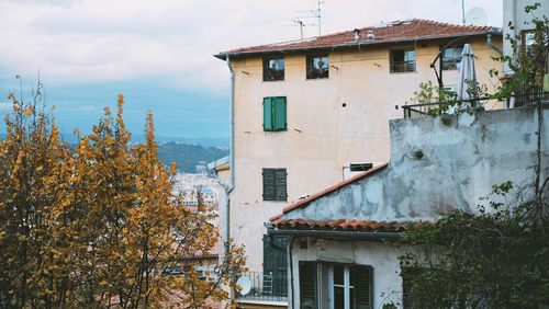 Low angle view of houses against sky