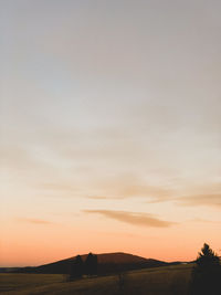 Scenic view of silhouette landscape against sky during sunset