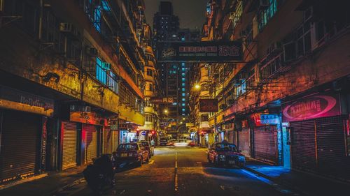 Illuminated empty road at night