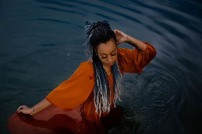 A photoshoot of girl in the water