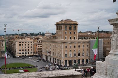 Buildings in city against sky