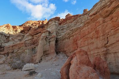 Landscape of multi colored barren rock formations in red rock canyon state park in california