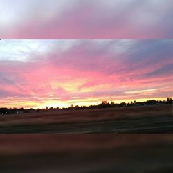 Scenic view of landscape at sunset