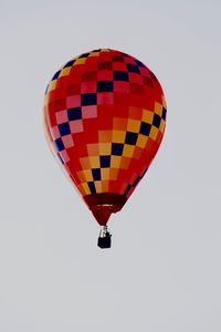 Low angle view of hot air balloon against clear sky