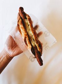 Close-up of hand holding bread