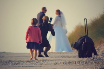 Photographing newly wed couple on road