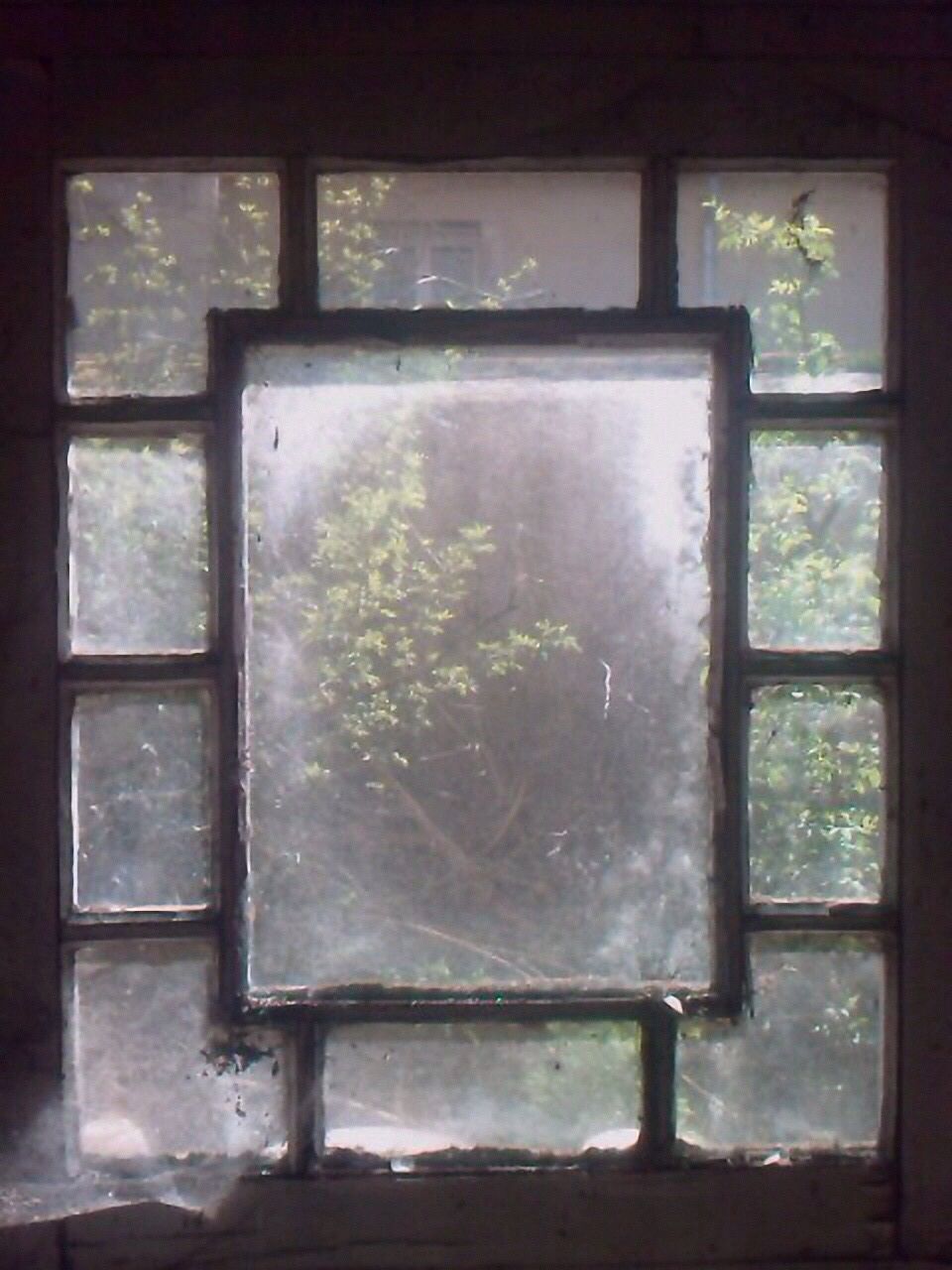 indoors, window, glass - material, transparent, home interior, house, close-up, no people, glass, day, wall - building feature, abandoned, built structure, old, closed, domestic room, open, wall, window sill, window frame