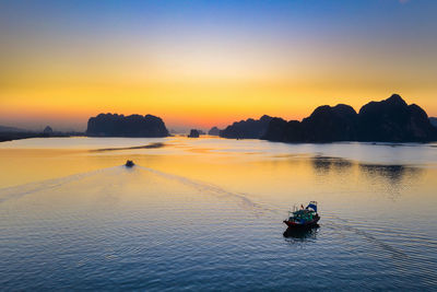 Scenic view of sea against sky during sunset