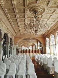 Interior of empty chairs and tables in building